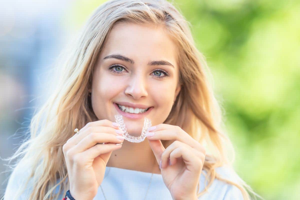 Woman smiling with Invisalign in Rocklin, Roseville, or Granite Bay